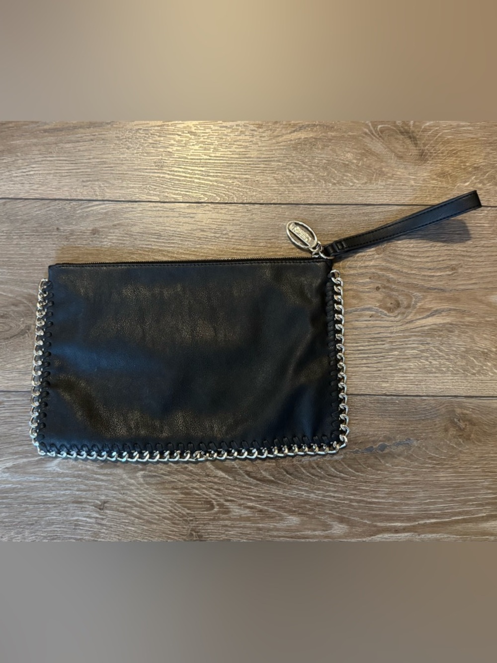Carlos Santana Black and Silver Chain Edge Wristlet.
